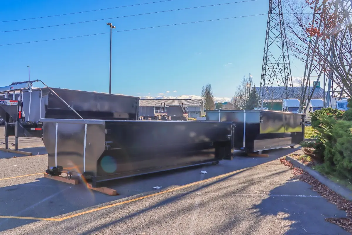 Roll-off dumpster ready for waste disposal at job site for 3 Yard Dumpster Rental in Richmond